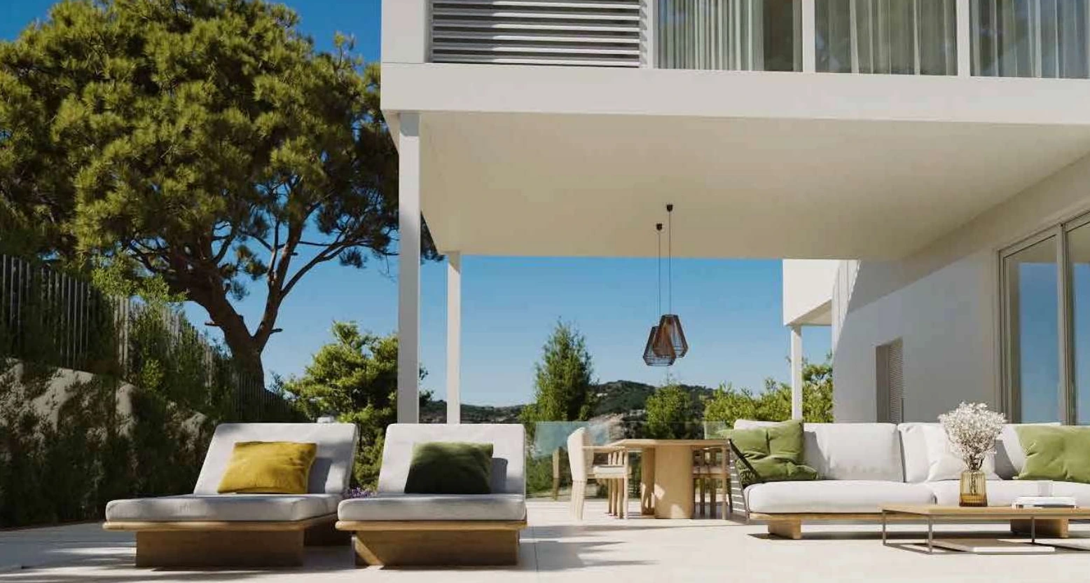 Porche exterior con zona chill-out junto al jardín