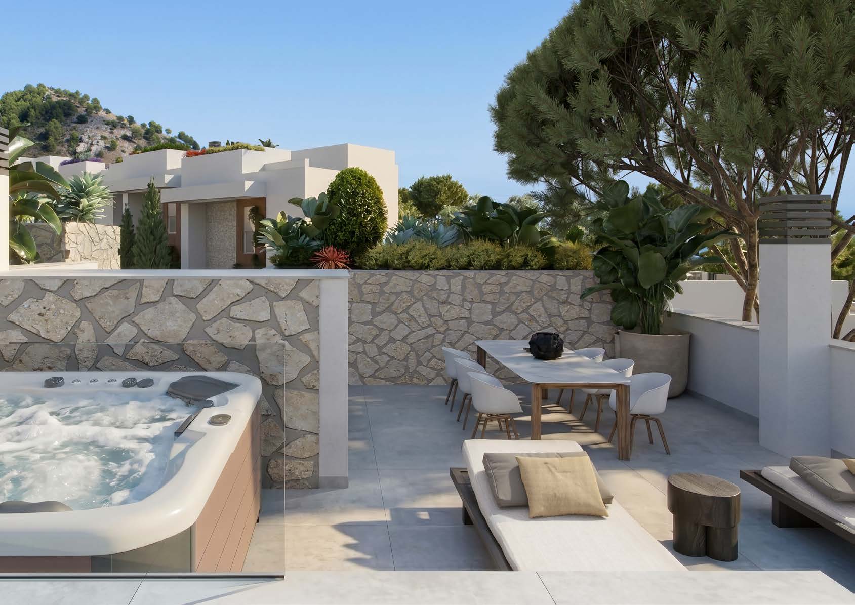 Fachada blanca de villa con terraza, buganvillas y pinos