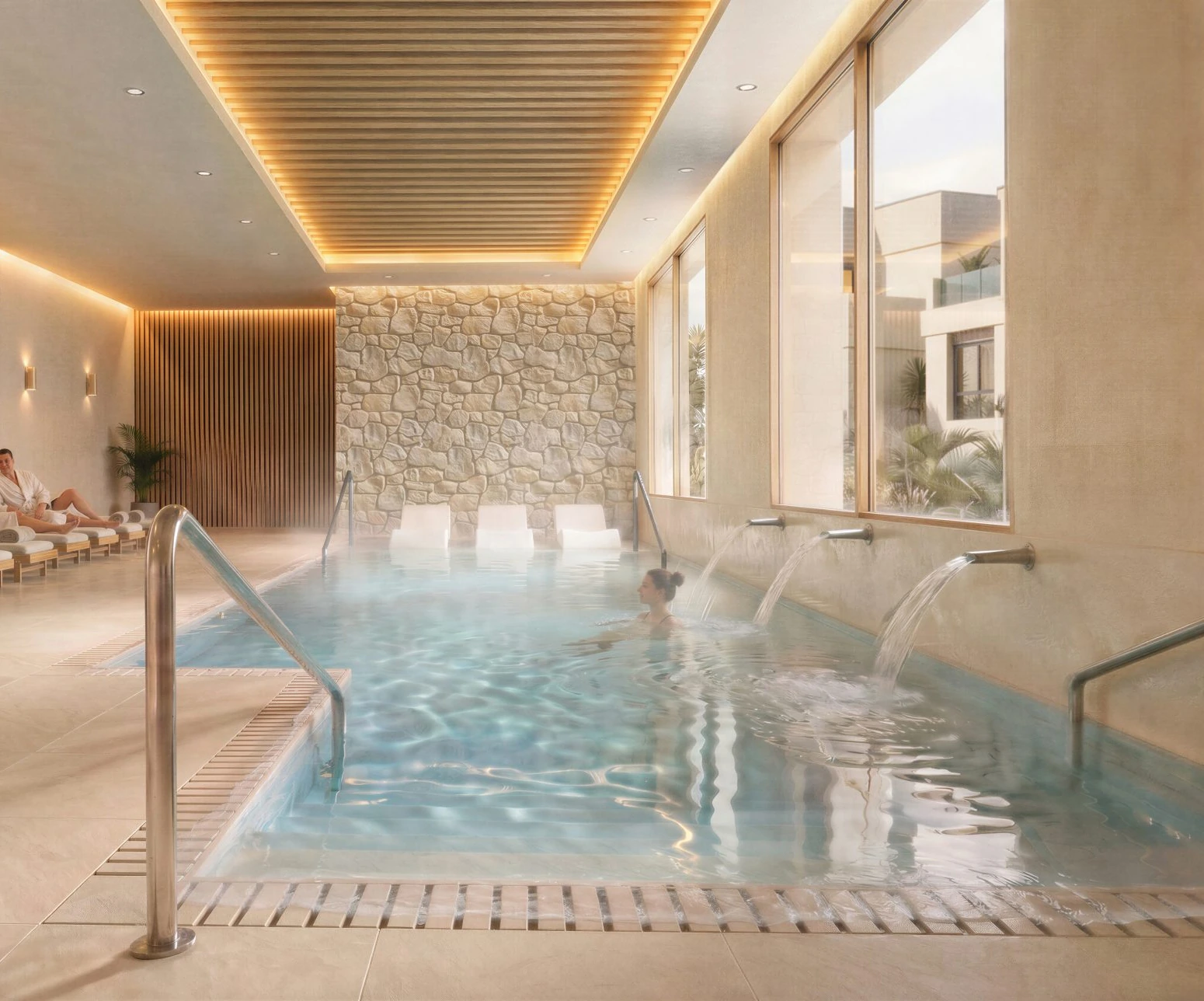 Spa interior con piscina climatizada