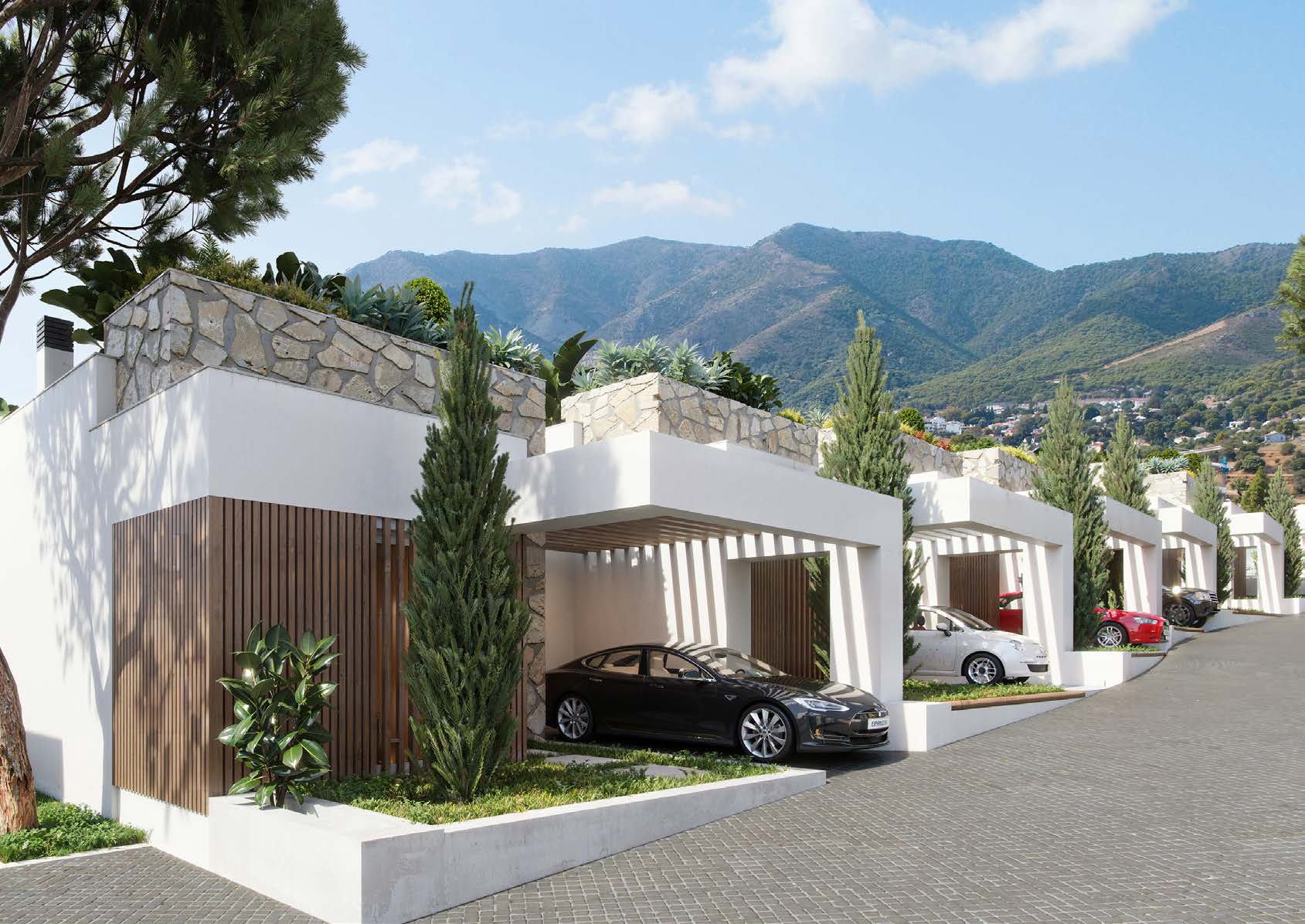 Acceso privado a las villas con la sierra de Mijas al fondo