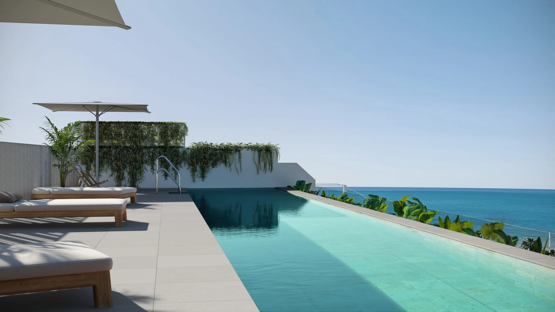 Piscina del residencial con vistas hacia el mar