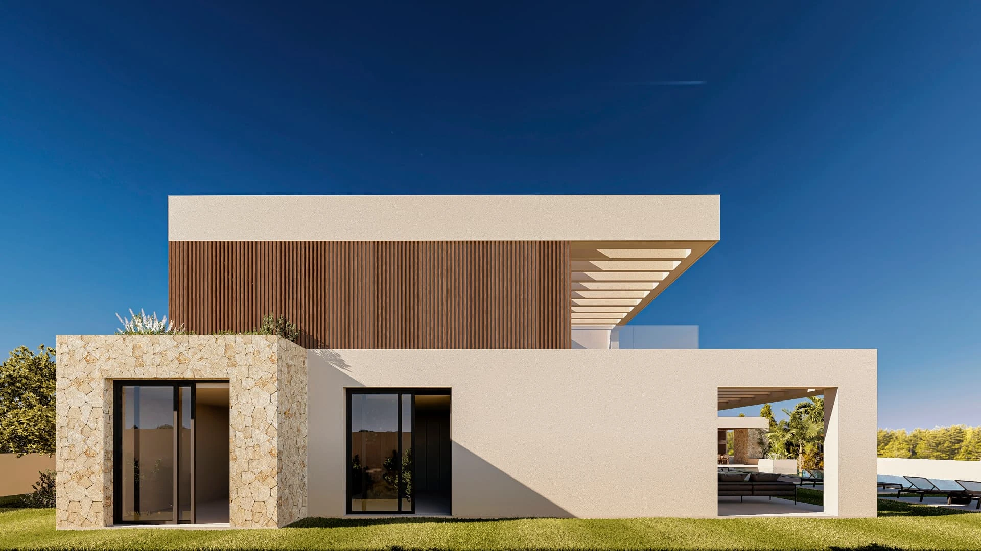 Fachada mediterránea con volúmenes de piedra y jardín