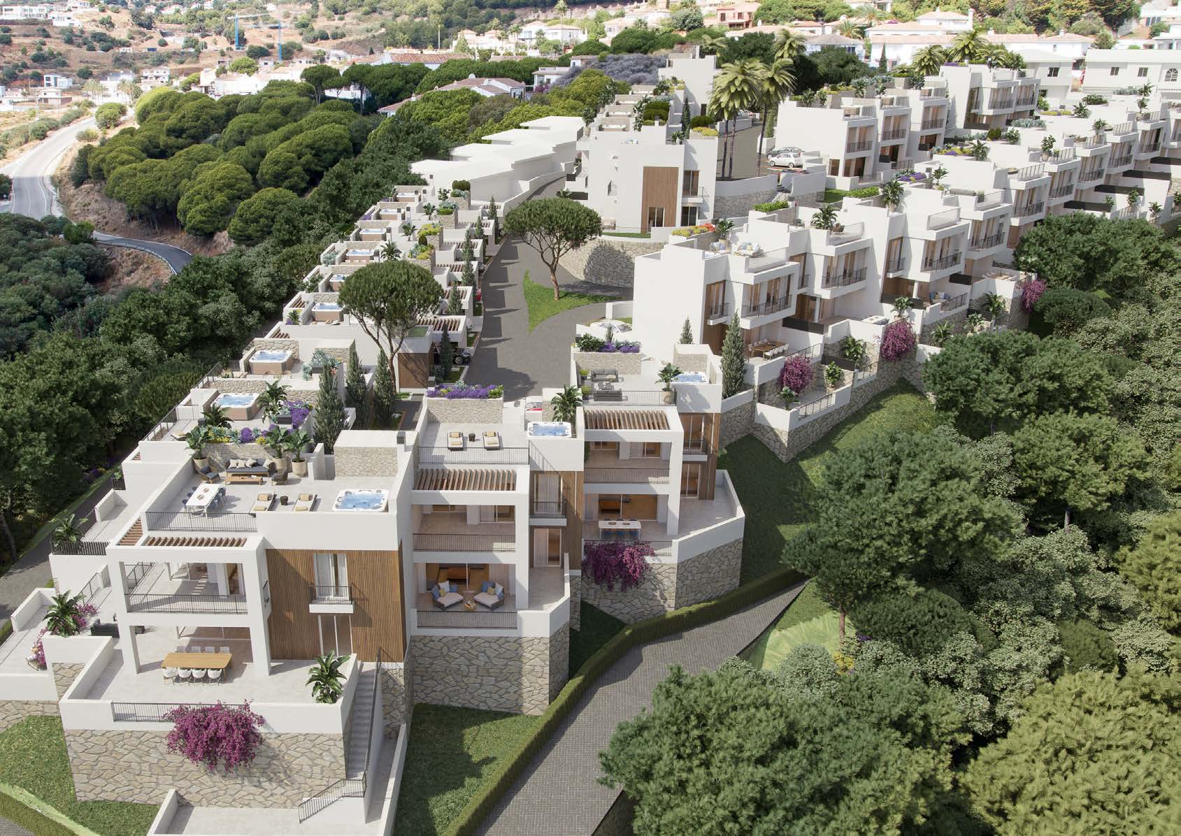 Vista aérea de las villas integradas en el paisaje mediterráneo