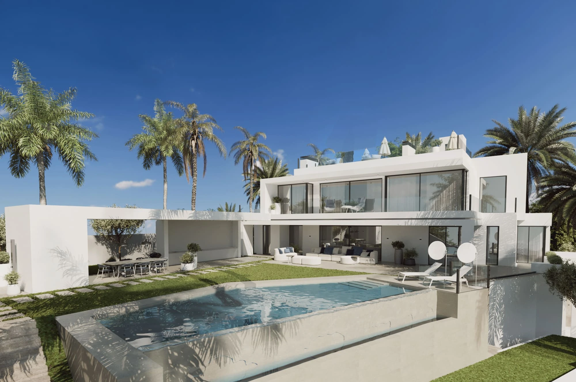 Piscina exterior y palmeras