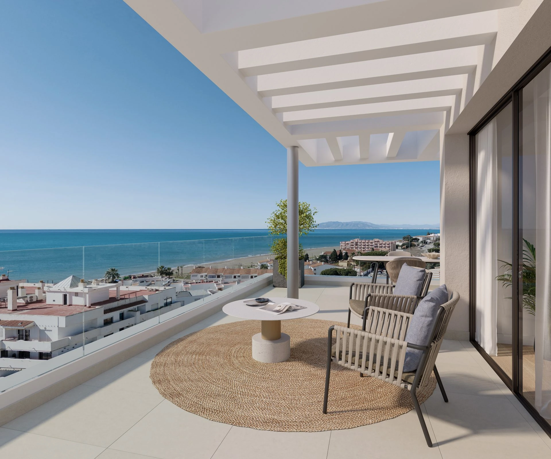 Terraza con comedor y horizonte marino