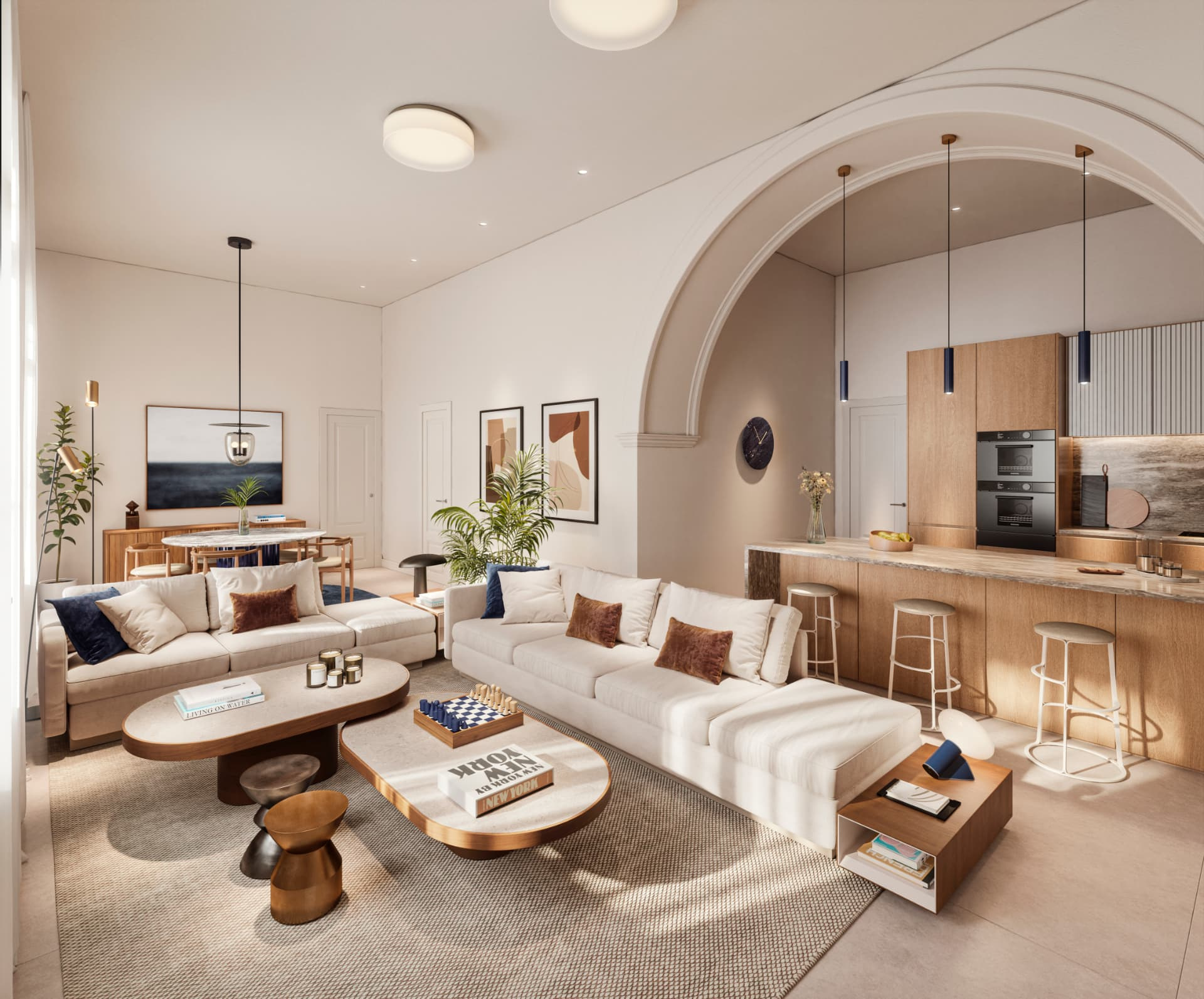 Salón de planta baja con arcos restaurados y cocina integrada
