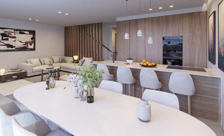 Salón y cocina abierta con isla y salida a la terraza