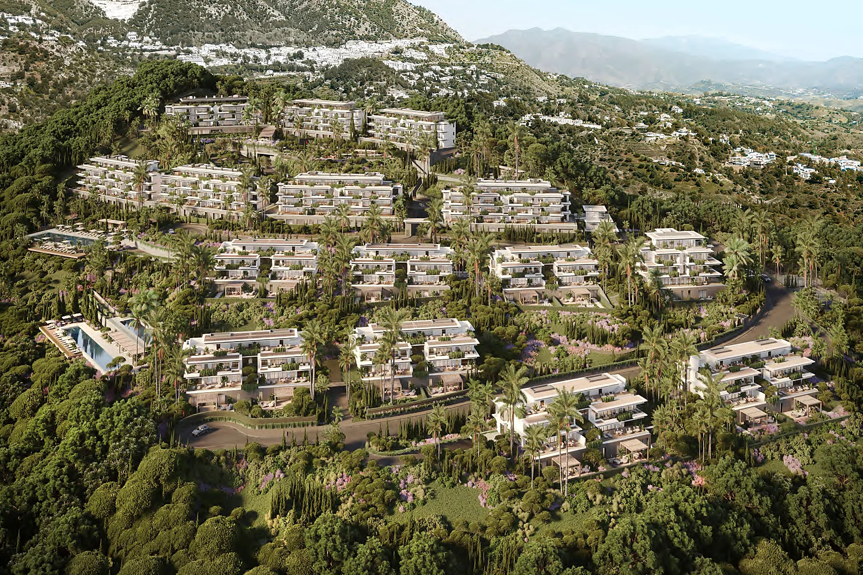 aéreo del conjunto Emerald View integrado en la ladera de Mijas